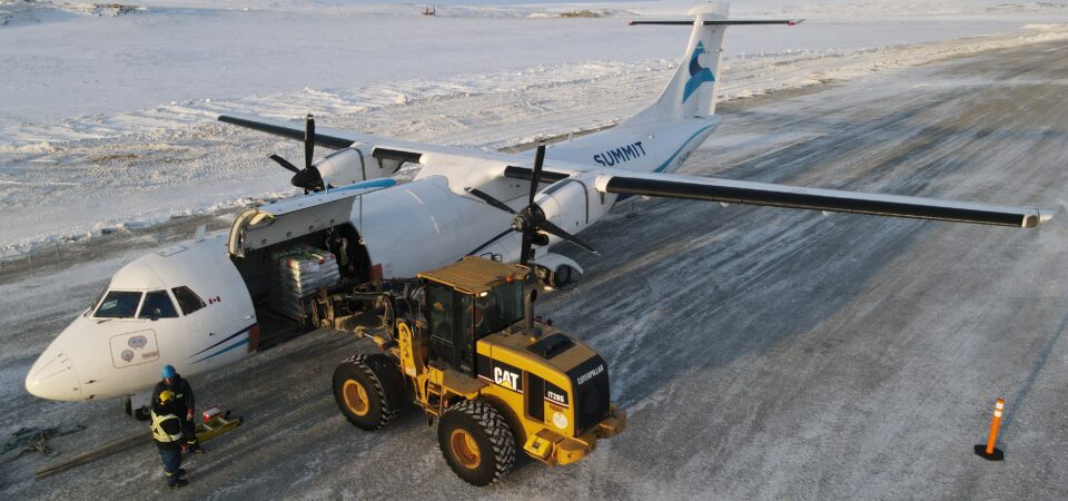 Aerial view of a plane being loaded